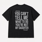 You Can't Tell Me What to Do funny dad graphic black T-shirt back flat lay
