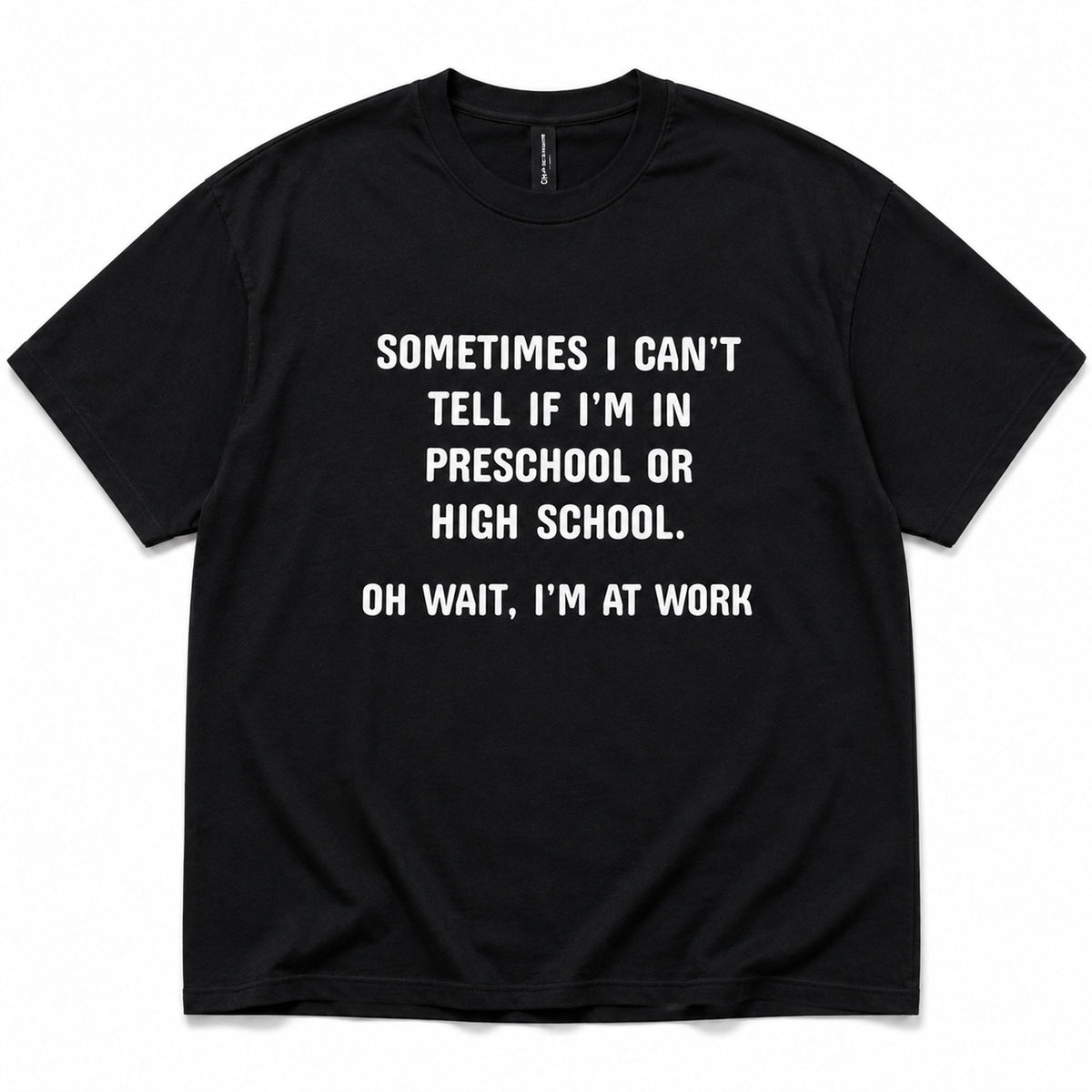Black funny work graphic tee with white preschool-or-high-school slogan front flat lay