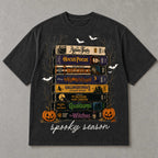 Spooky Season retro horror VHS stack graphic tee washed black front print flat lay