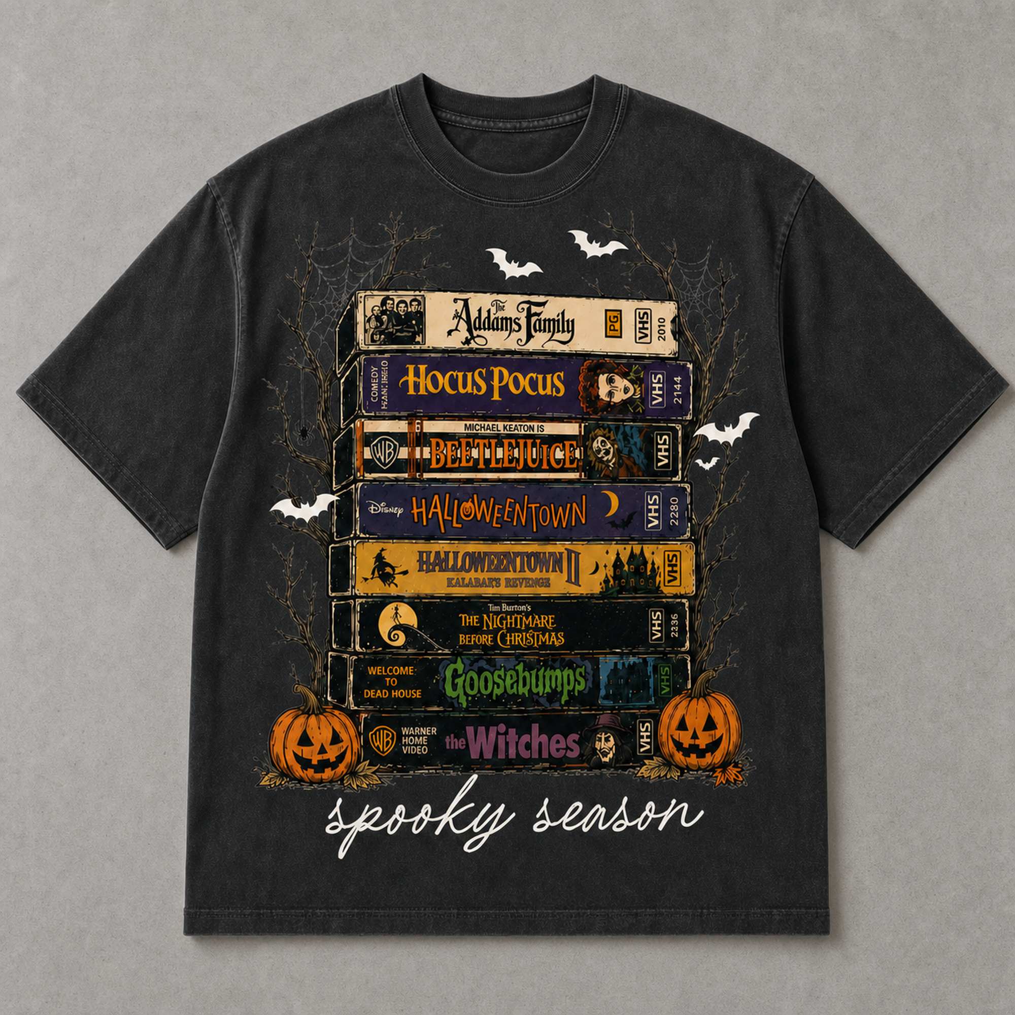 Spooky Season retro horror VHS stack graphic tee washed black front print flat lay